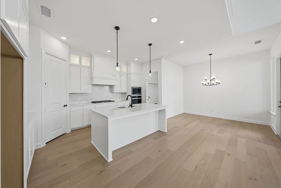 Furnished interior view inside a new home in Light Farms Brenham - 40' Lots, Celina (Image 10).