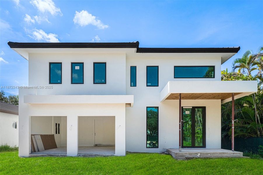 Front exterior of a new home in , Miami, FL, highlighting curb appeal (Image 2).