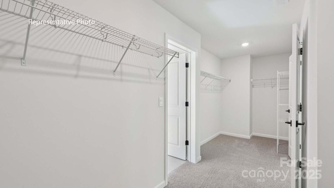 Spacious, unfurnished interior of a new home in Sanctuary at Southgate, Indian Trail (Image 17).