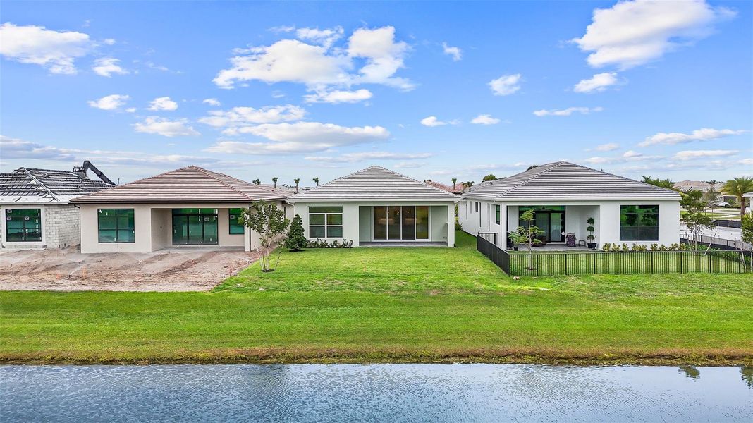 Exterior details and patio area of a home in Cresswind Palm Beach at Westlake, Westlake (Image 31).