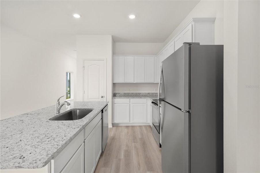 Furnished interior view inside a new home in Gum Lake Preserve, Lake Alfred (Image 6).