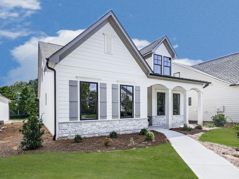 Front exterior of a new home in , Holly Springs, GA, highlighting curb appeal (Image 23). Front exterior of a new home in , Holly Springs, GA, highlighting curb appeal (Image 23).