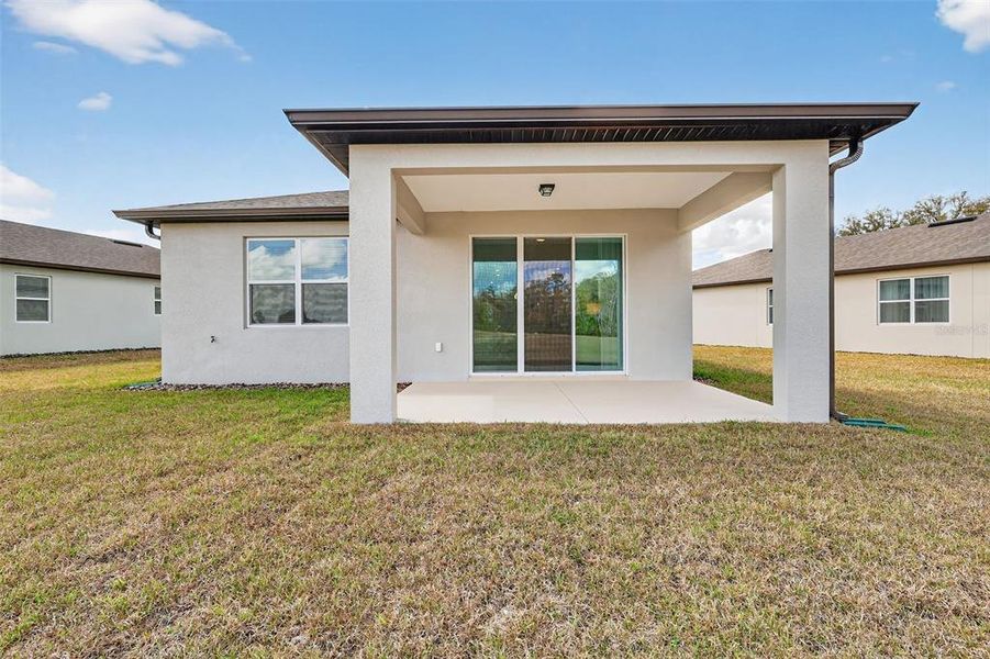 Exterior details and patio area of a home in , Ocala (Image 27).