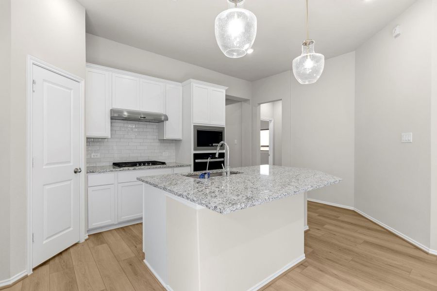 Furnished interior view inside a new home in Grand Central Park, Conroe (Image 6).