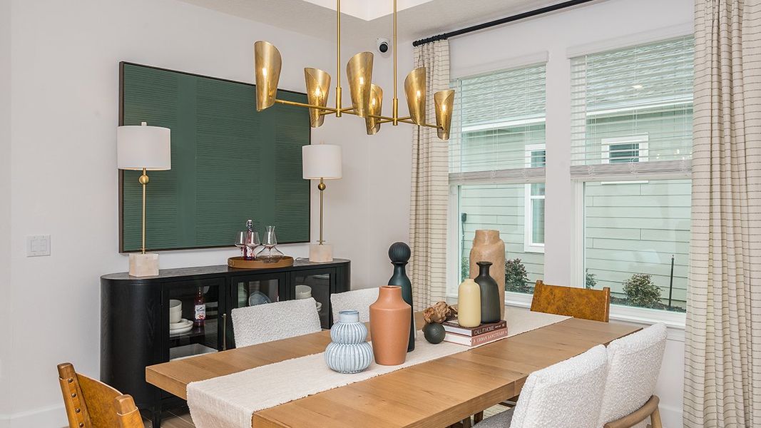 Furnished interior view inside a new home in Esplanade at Kingston, Estero (Image 8).