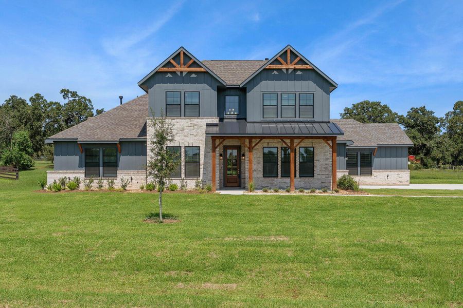 Beautiful Farmhouse Elevation- spacious lot