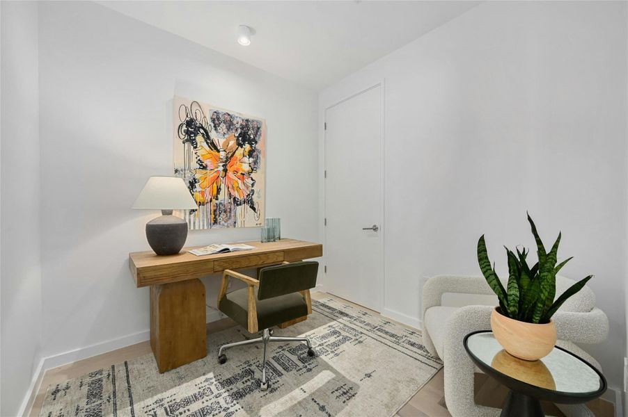 The den can serve as a versatile space, ideal for use as an office or study. The den can serve as a versatile space, ideal for use as an office or study.