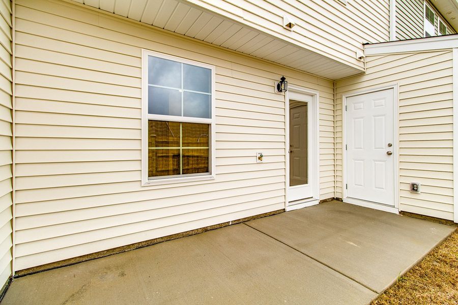 Exterior details and patio area of a home in Astoria, Columbia (Image 3).