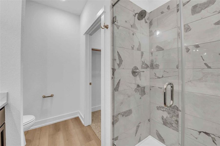 Please Note: These interior photos are not of the actual home but are of a completed one with a similar floor plan. Finishes, features, and layouts may vary.