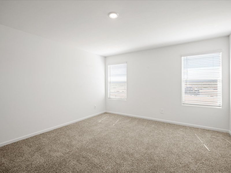 Spacious, unfurnished interior of a new home in Las Patrias at Star Valley Phase III - Premier Series, Tucson (Image 12).