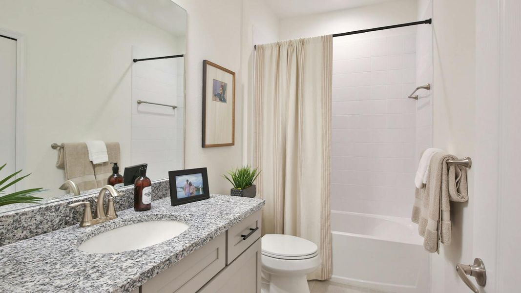 Furnished interior view inside a new home in Palm Grove Real Estate and Homes for Sale in Lakewood Ranch, FL - Neal Communities, Lakewood Ranch (Image 6).