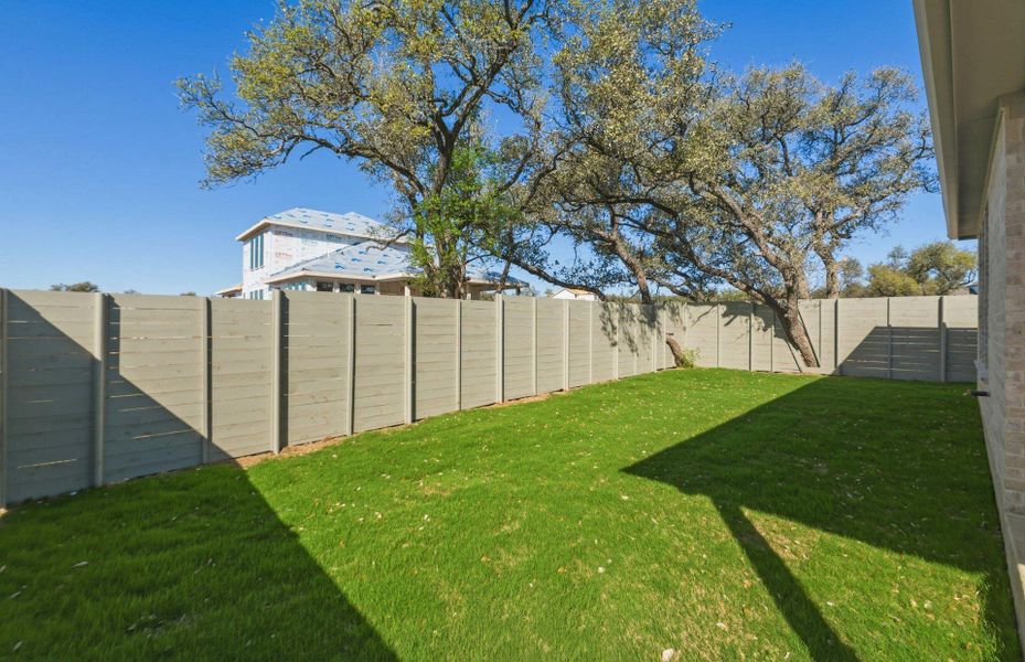 Exterior details and patio area of a home in Wolf Ranch, Georgetown (Image 19).