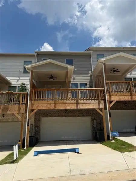 Exterior details and patio area of a home in Towns at Enclave, Lawrenceville (Image 3). Exterior details and patio area of a home in Towns at Enclave, Lawrenceville (Image 3).