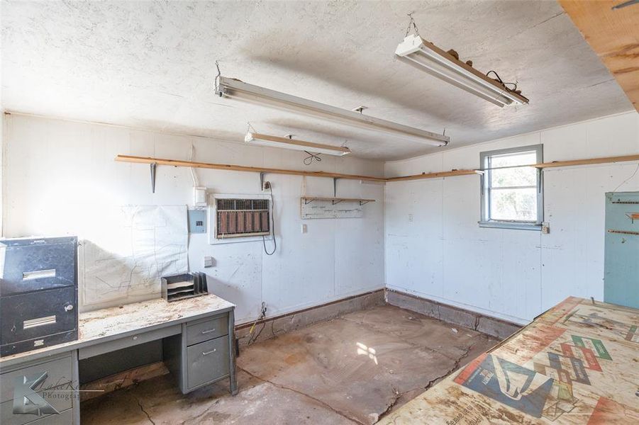 Below grade area featuring a textured ceiling Below grade area featuring a textured ceiling