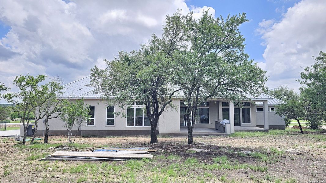 Exterior details and patio area of a home in , New Braunfels (Image 35).