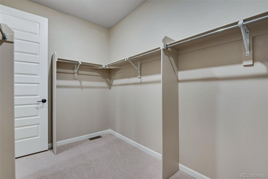 Spacious, unfurnished interior of a new home in Reunion Ridge, Commerce City (Image 49).