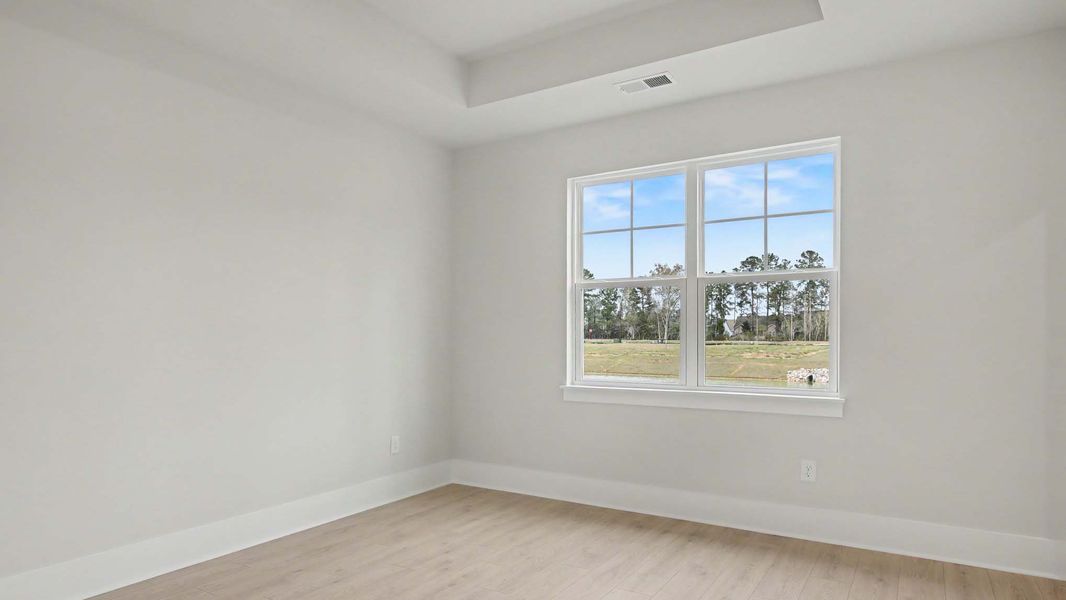 Representative unfurnished interior of a home built from the Calvert by D.R. Horton in Chapman Village, Conway (Image 10).