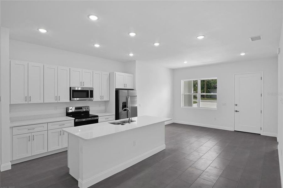 Furnished interior view inside a new home in , Dunnellon (Image 8).