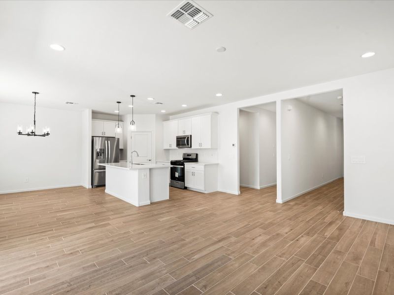 Spacious, unfurnished interior of a new home in Mandarina - Signature Series, Marana (Image 9).