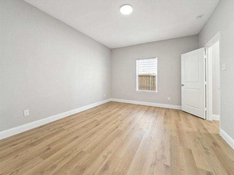 Spare room with light hardwood / wood-style floors