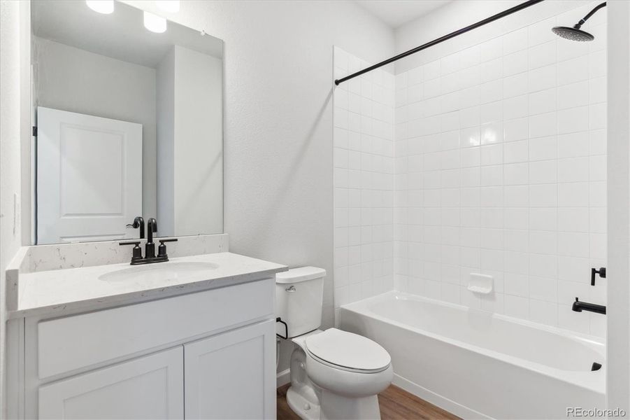 Furnished interior view inside a new home in Townhome Collection at Grand Vue at Interlocken, Broomfield (Image 8).