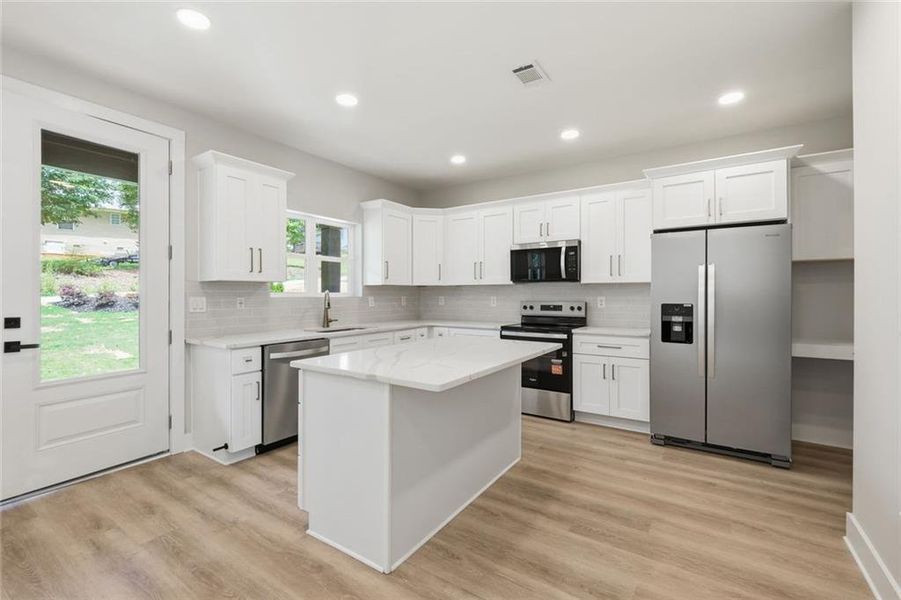 Furnished interior view inside a new home in , Cumming (Image 7).