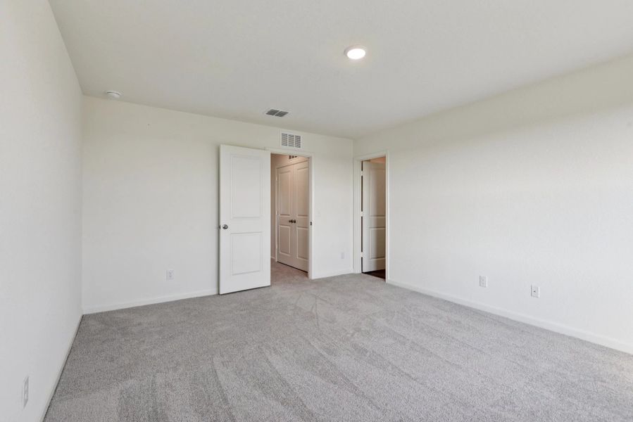 Representative unfurnished interior of a home built from the Compass by Starlight Homes in The Wilder, Adkins (Image 19).