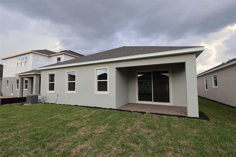 Exterior details and patio area of a home in Center Lake on the Park, St. Cloud (Image 3).
