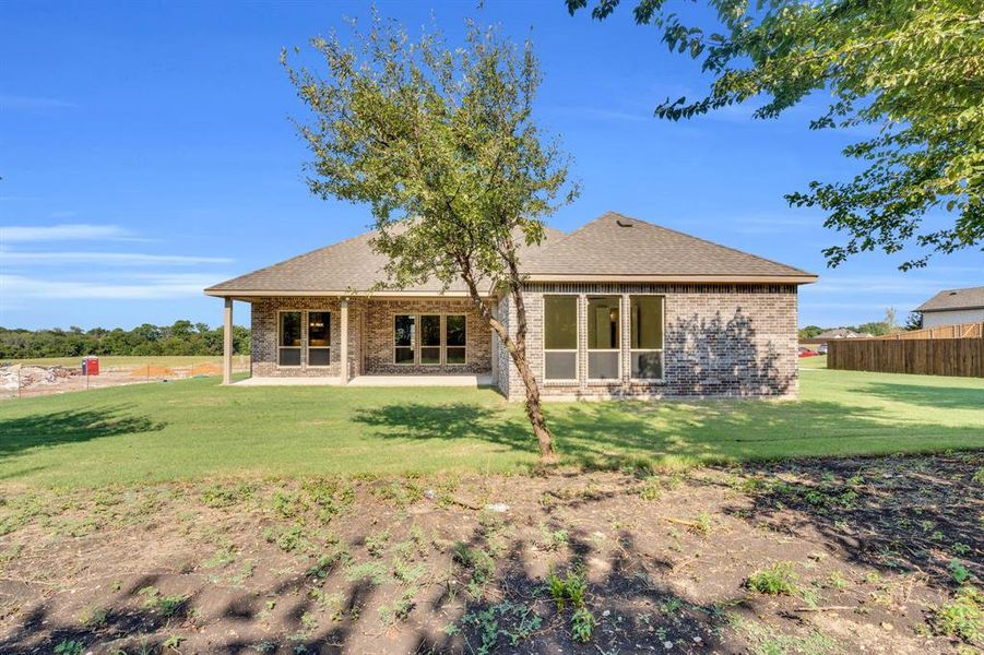 Front exterior of a new home in , Red Oak, TX, highlighting curb appeal (Image 24). Front exterior of a new home in , Red Oak, TX, highlighting curb appeal (Image 24).