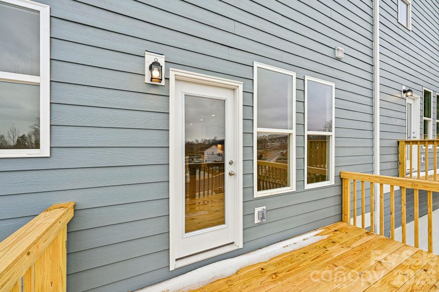 Exterior details and patio area of a home in Vanguard at Vermillion, Huntersville (Image 22).