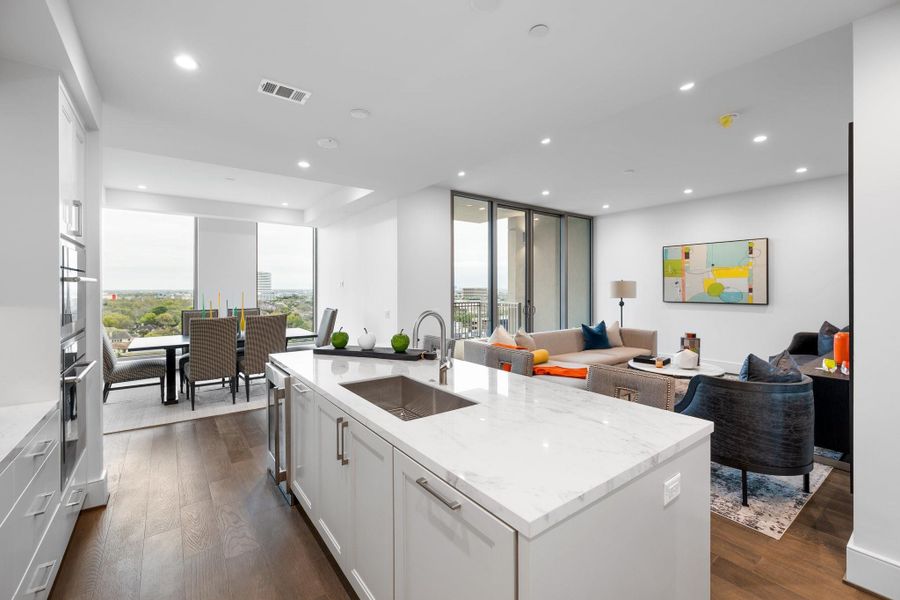 View of the kitchen, living room and dining room. View of the kitchen, living room and dining room.