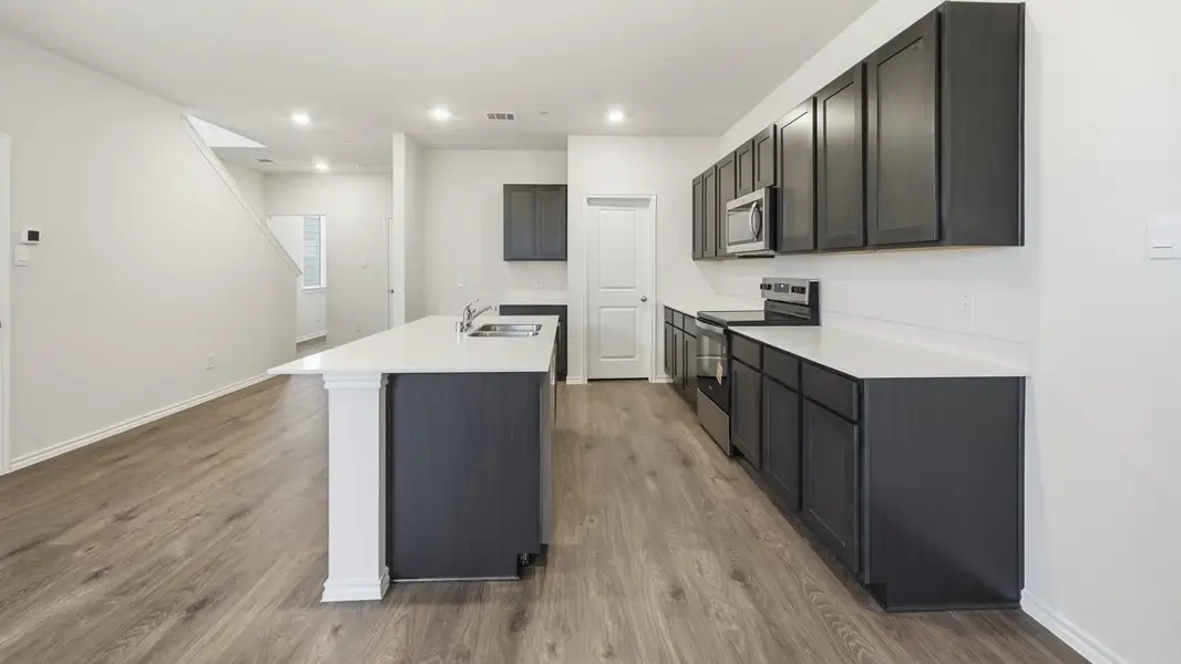 Representative furnished interior of a home built from the Adeline by D.R. Horton in Arbor Trails South, Princeton (Image 6).