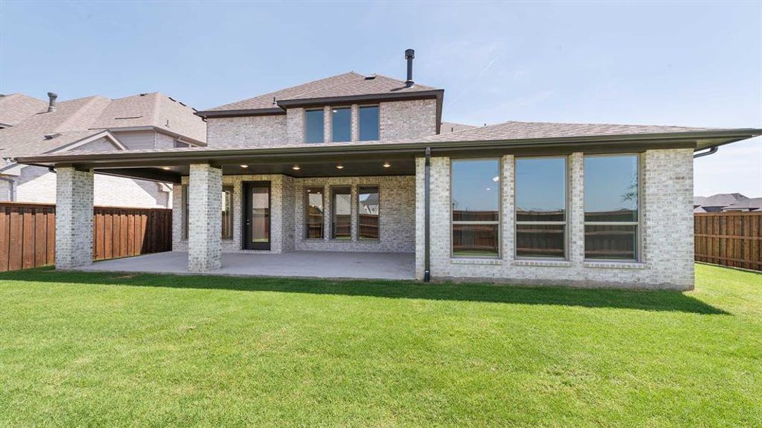 Front exterior of a new home in Mosaic 50', Celina, TX, highlighting curb appeal (Image 2). Front exterior of a new home in Mosaic 50', Celina, TX, highlighting curb appeal (Image 2).