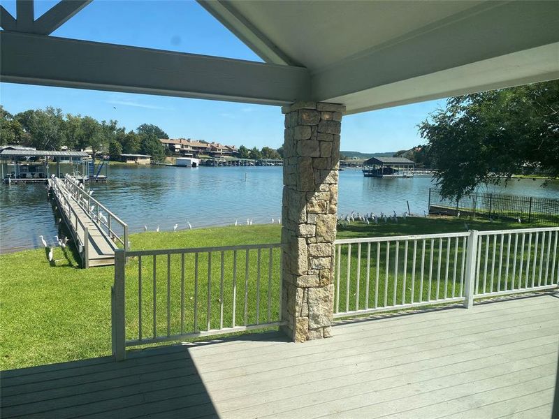Exterior details and patio area of a home in , Graford (Image 15).