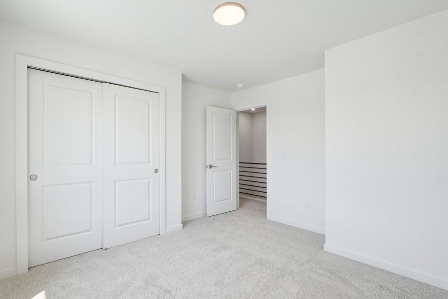 Spacious, unfurnished interior of a new home in The Vistas at West Mesa, Colorado Springs (Image 22).