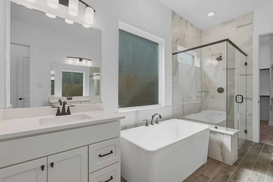 Representative furnished interior of a home built from the Sorenstam by Chesmar Homes in Riceland Alley Loads, Mont Belvieu (Image 17).