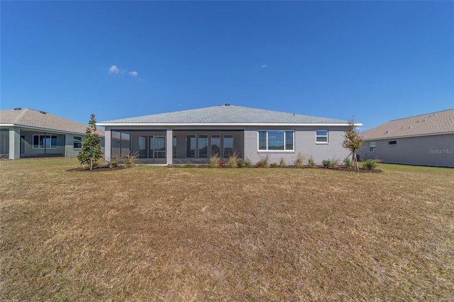 Exterior details and patio area of a home in On Top of the World Communities, Ocala (Image 3).