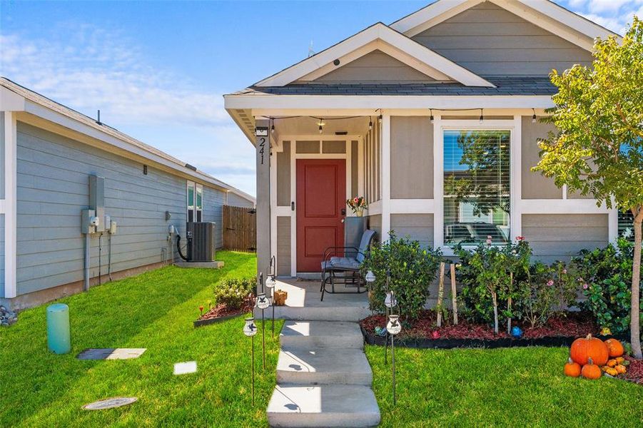 View of front of home with a shingled roof View of front of home with a shingled roof