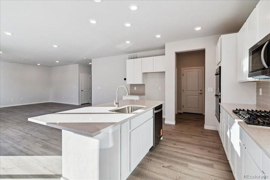 Furnished interior view inside a new home in Floret Collection at Alder Creek, Parker (Image 6). Furnished interior view inside a new home in Floret Collection at Alder Creek, Parker (Image 6).