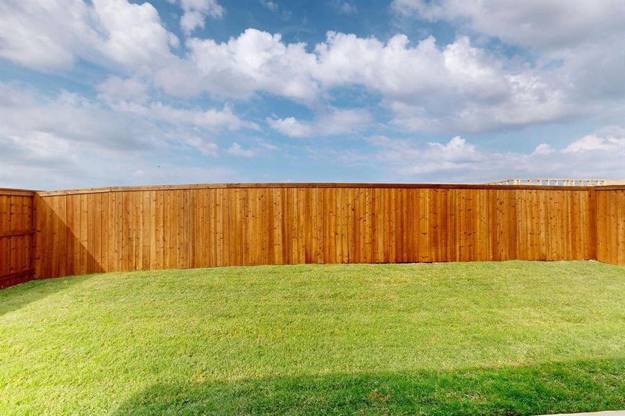 Exterior details and patio area of a home in Mobberly Farms, Pilot Point (Image 21). Exterior details and patio area of a home in Mobberly Farms, Pilot Point (Image 21).