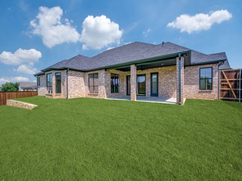 Front exterior of a new home in , Denton, TX, highlighting curb appeal (Image 1). Front exterior of a new home in , Denton, TX, highlighting curb appeal (Image 1).
