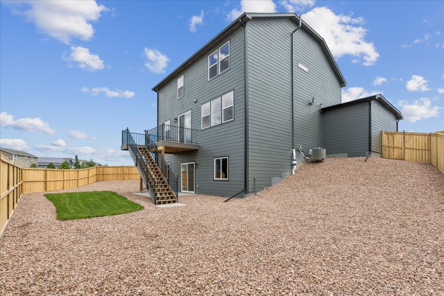 Exterior details and patio area of a home in Aspen Meadows, Colorado Springs (Image 4).