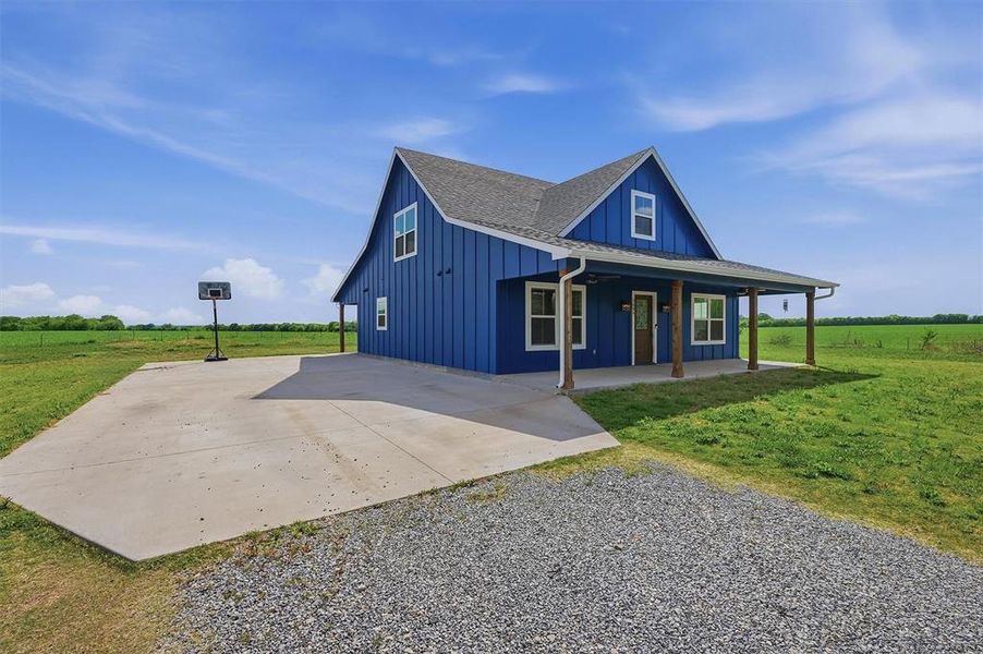 Front exterior of a new home in , Sherman, TX, highlighting curb appeal (Image 21).