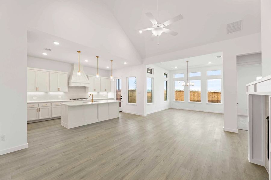 Open Kitchen-Living-Dining Room featuring the Serene Collection