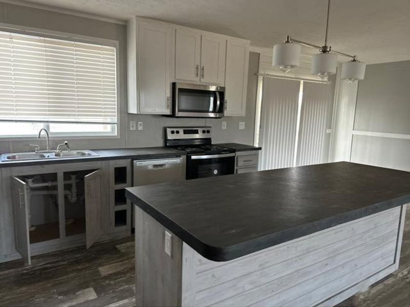 Furnished interior view inside a new home in , Pawnee (Image 4).