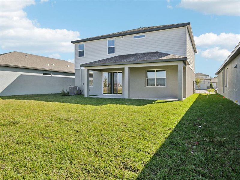 Exterior details and patio area of a home in Coasterra - Reserve Series, Palmetto (Image 24).