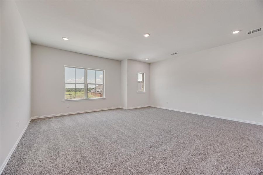 Spacious, unfurnished interior of a new home in Valencia On The Lake, Little Elm (Image 32).