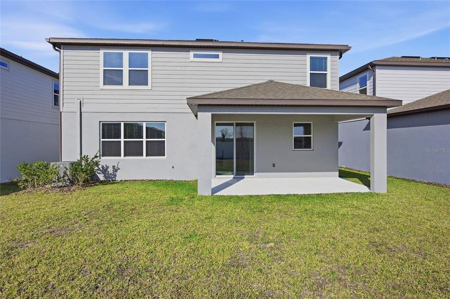 Exterior details and patio area of a home in Marion Ranch, Ocala (Image 34).
