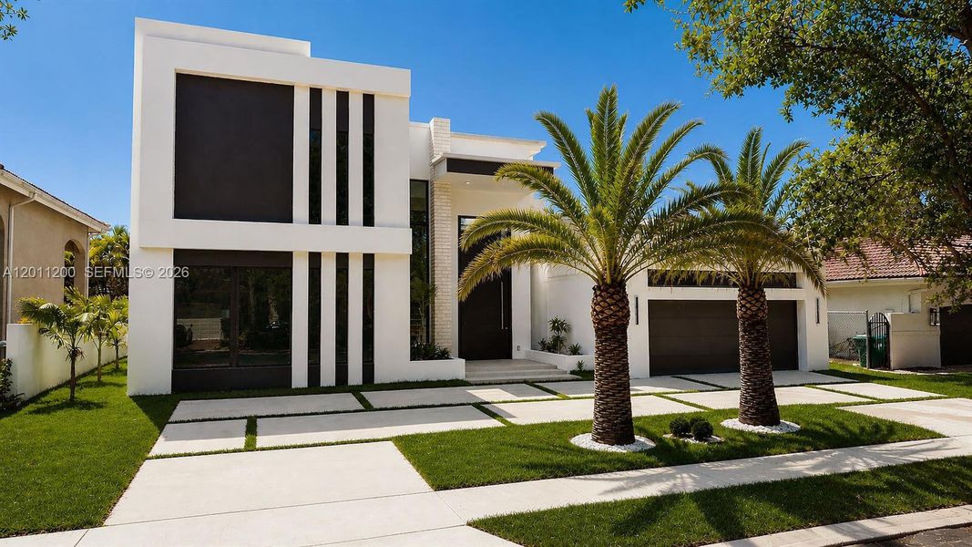 Front exterior of a new home in , Miami Lakes, FL, highlighting curb appeal (Image 30).