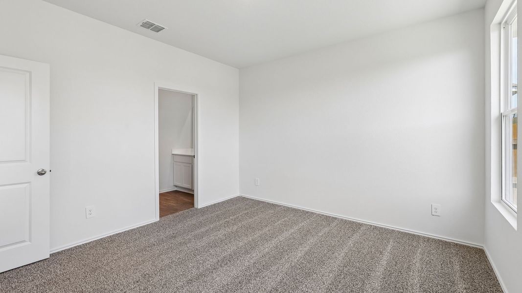 Spacious, unfurnished interior of a new home in Wayside, Uhland (Image 26).